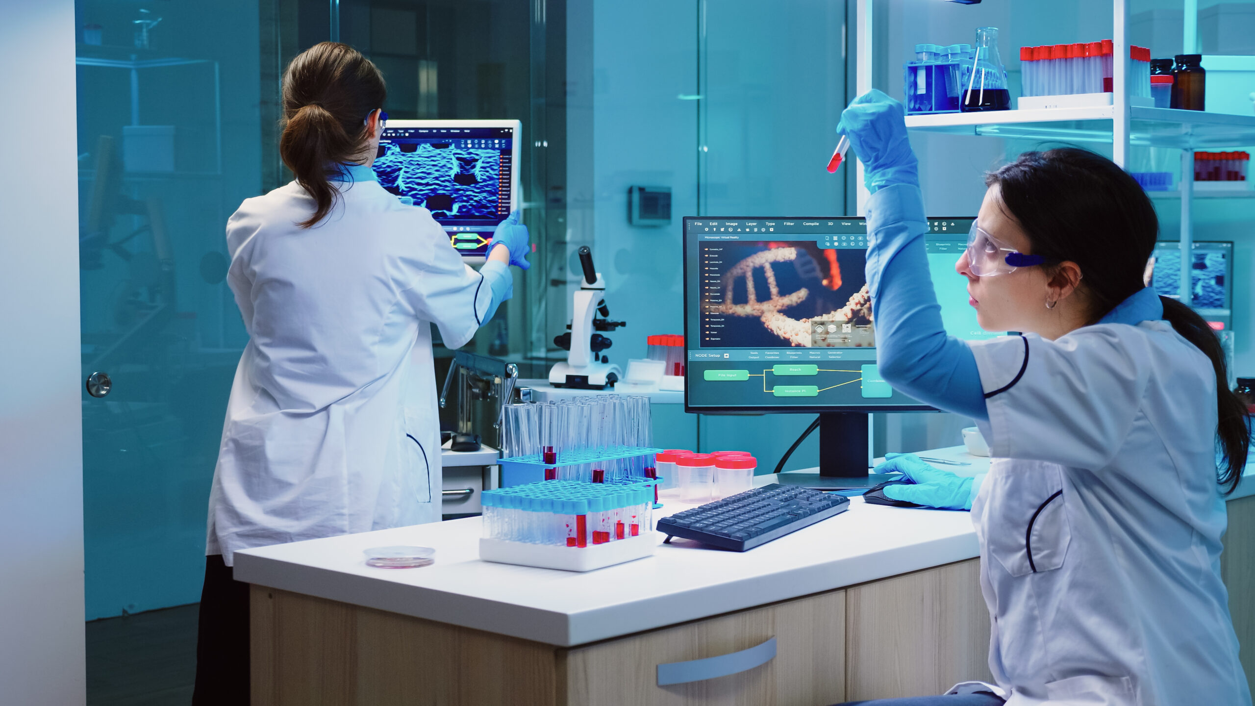 group of scientists wearing lab coat working in laboratory